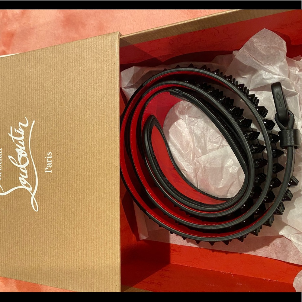 This leather Italian is decorated with Christian Louboutin's iconic spikes